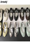 Spring Autumn Flats Shoes Women Niche Design Sense Shallow Round Toe Retro Almond Head Cross Strap Flat Mary Jane